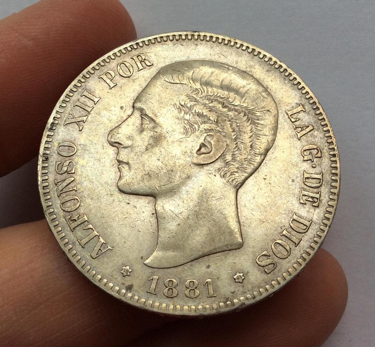 Moneda de 1881 con la cara de Alfonso XIII.
