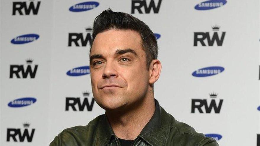 Robbie Williams anuncia la llegada de su cuarto hijo