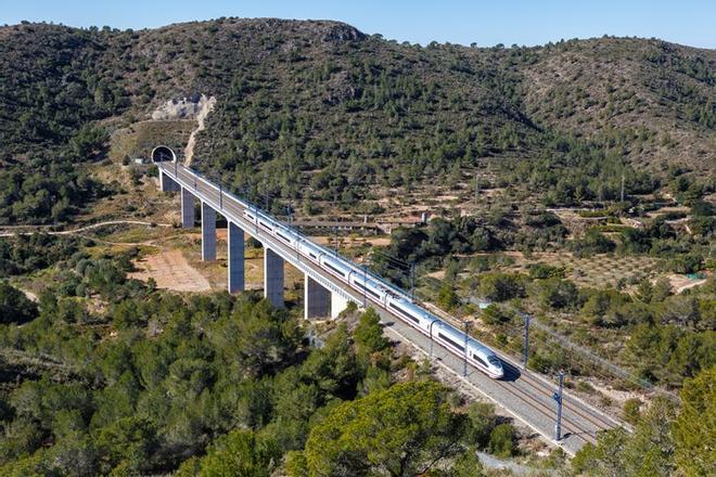 AVE Siemens Velaro high-speed train of RENFE on the Madrid - Barcelona high speed rail railway line near Roda de Bera in Spain