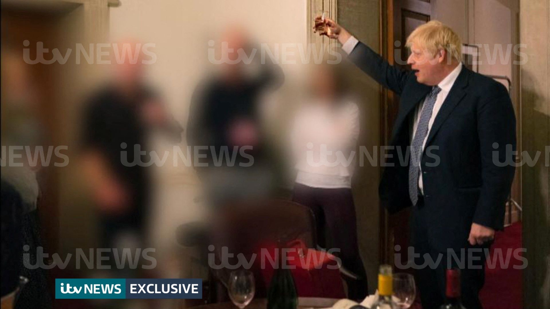 A handout picture shows British Prime Minister Boris Johnson raising a glass during a party at Downing Street, amid the coronavirus disease (COVID-19) pandemic in London, Britain November 13, 2020. Picture taken November 13, 2020. ITV News/Handout via REUTERS THIS IMAGE HAS BEEN SUPPLIED BY A THIRD PARTY. MANDATORY CREDIT. NO RESALES. NO ARCHIVES. BLURRING AND WATERMARKS FROM SOURCE  3TP MNDTY NARCH/NARCH30