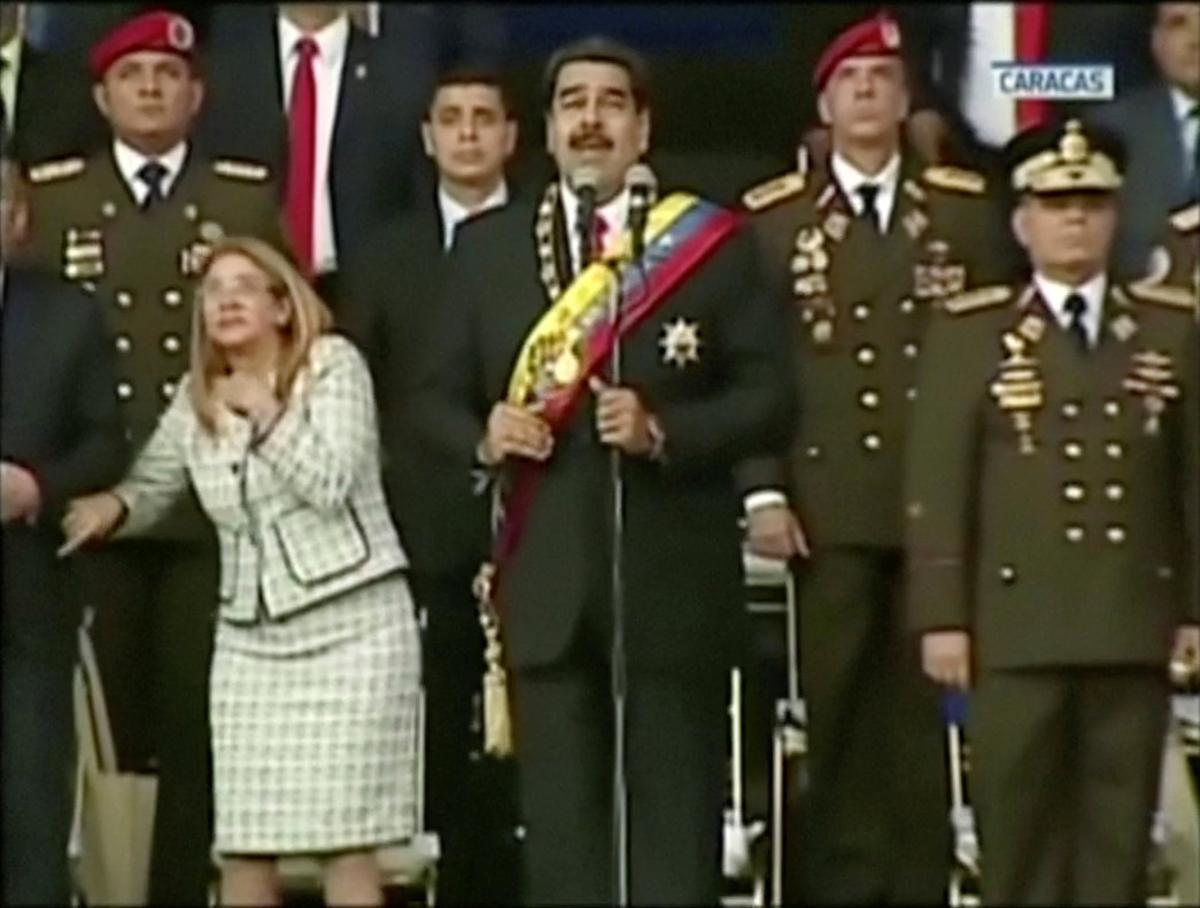 Venezuelan President Nicolas Maduro reacts during an event which was interrupted, in this still frame taken from video August 4, 2018, Caracas, Venezuela. VENEZUELAN GOVERNMENT TV/Handout via REUTERS TV.  ATTENTION EDITORS - THIS IMAGE HAS BEEN PROVIDED BY A THIRD PARTY.