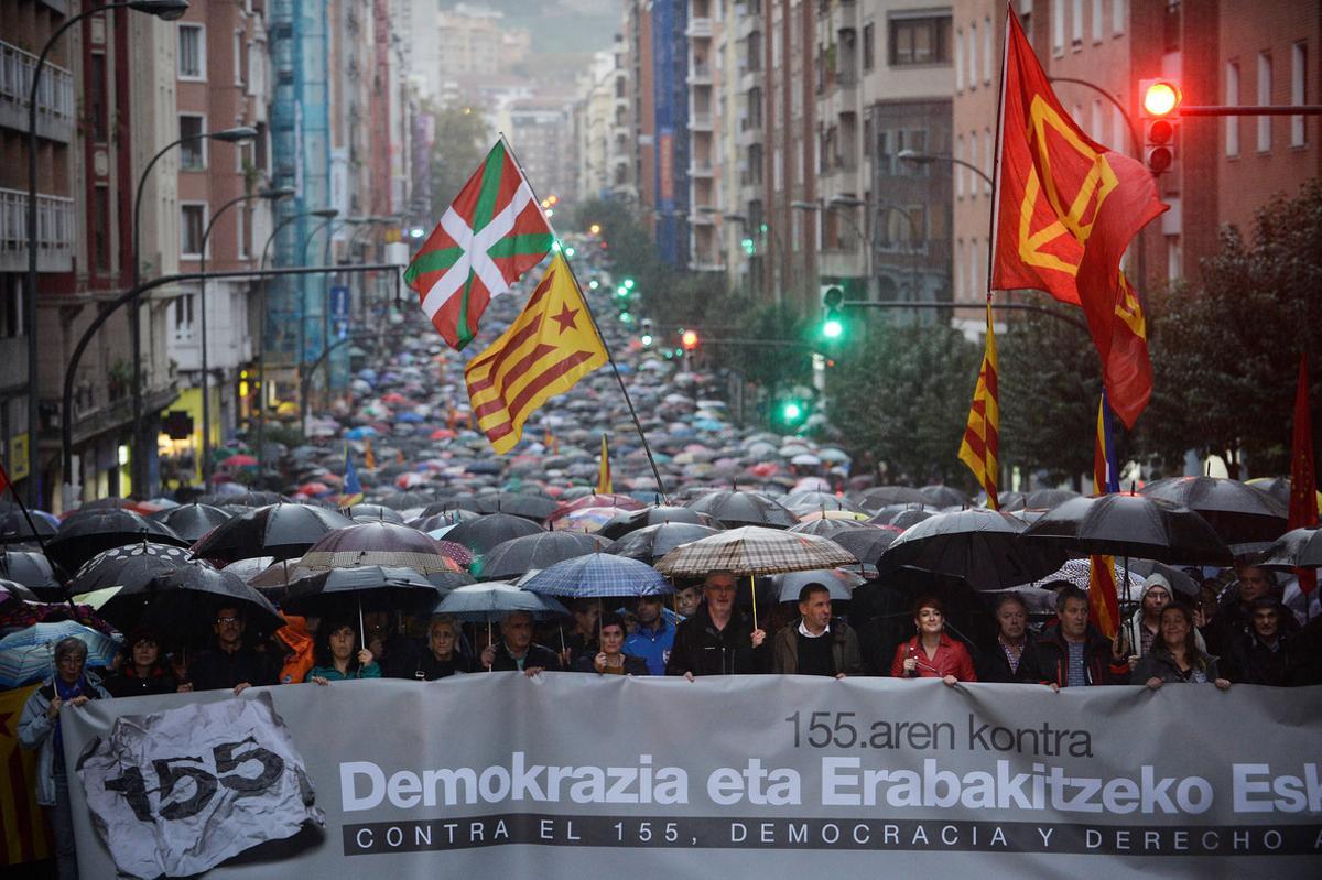 (7L-R) Garbine Aranburu of trade union LAB, Adolfo Munoz of trade union ELA and Arnaldo Otegi of Basque nationalist party EH Bildu, take part in a demonstration against Article 155 of the Spanish Constitution allowing the Spanish Government to take control of Catalan institutions, in Bilbao, November 4, 2017. The banner reads Democracy and the right to decide. REUTERS/Vincent West