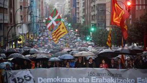 (7L-R) Garbine Aranburu of trade union LAB, Adolfo Munoz of trade union ELA and Arnaldo Otegi of Basque nationalist party EH Bildu, take part in a demonstration against Article 155 of the Spanish Constitution allowing the Spanish Government to take control of Catalan institutions, in Bilbao, November 4, 2017. The banner reads Democracy and the right to decide. REUTERS/Vincent West