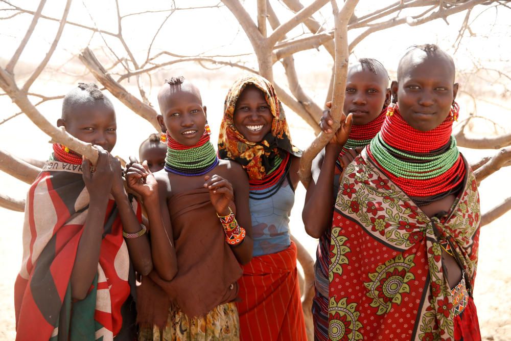 Turkana girls are seen at a waterhole near ...