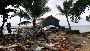 A car is seen among ruins after a tsunami hit Carita beach in Pandeglang  Banten province  Indonesia  December 23  2018  REUTERS Adi Kurniawan TPX IMAGES OF THE DAY