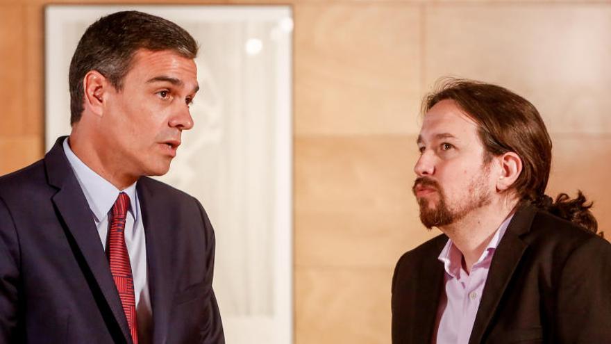 Iglesias i Sánchez, durant una reunió