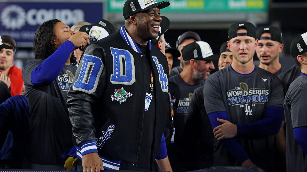 Magic Johnson, con los jugadores de los Dodgers en Nueva York.