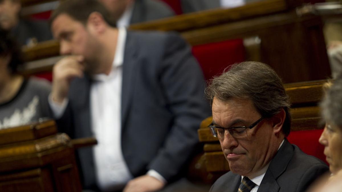 Artur Mas y Oriol Junqueras, durante una sesión del Parlament, el pasado 13 de febrero.