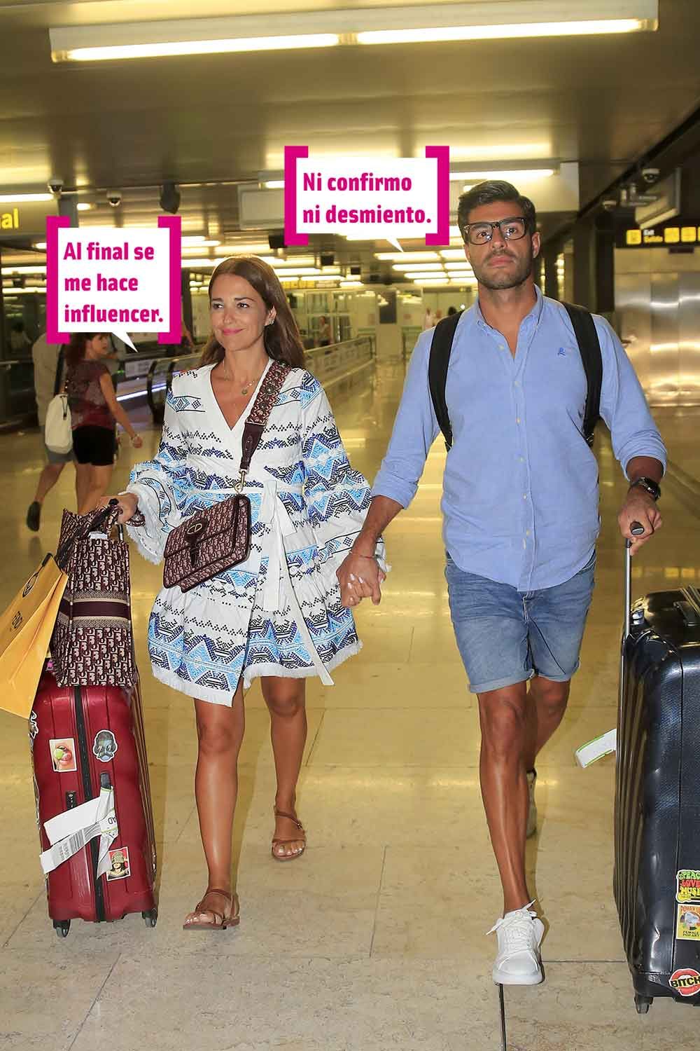 Miguel Torres y Paula Echevarría en el aeropuerto