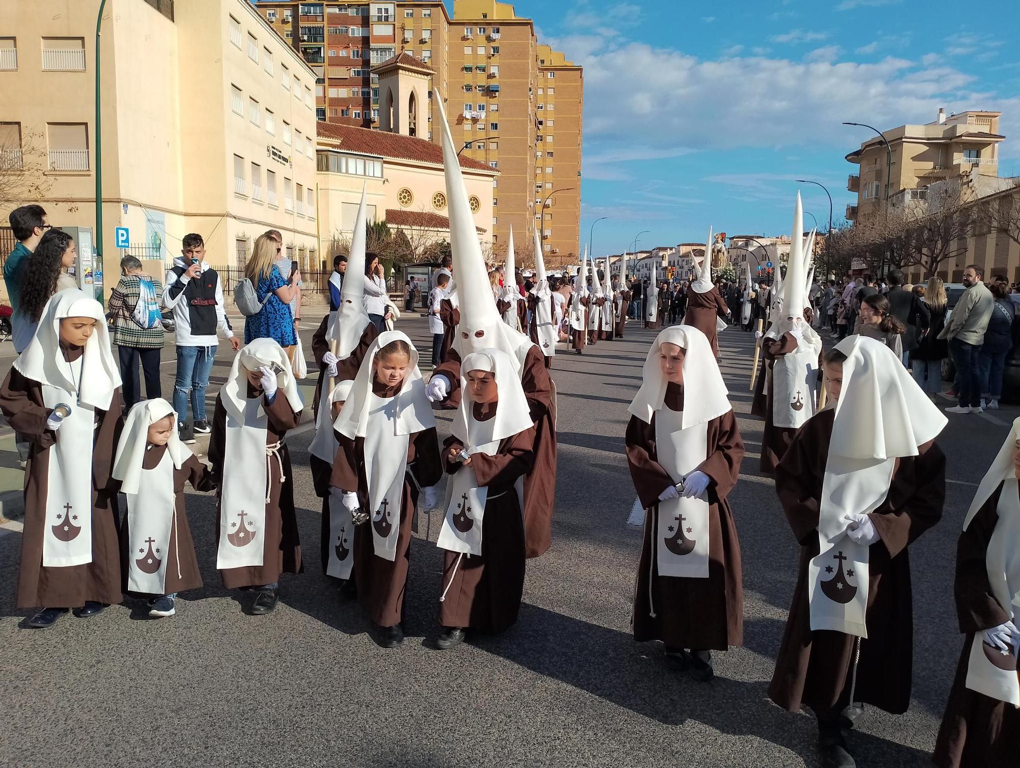 La procesión de la Virgen de Lágrimas del Carmen de Huelin, en imágenes