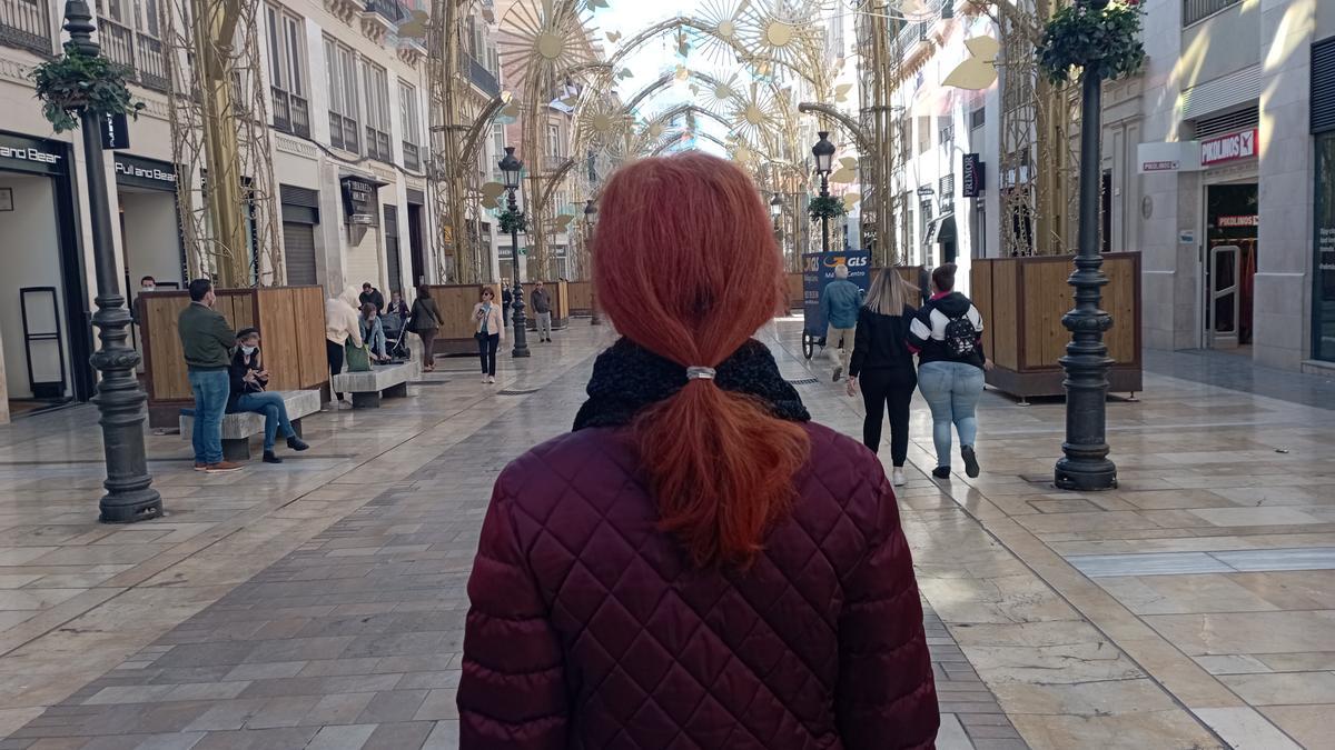 María, ayer en la calle Larios, quiere atención psiquiátrica para su hijo, denegada en dos ocasiones.