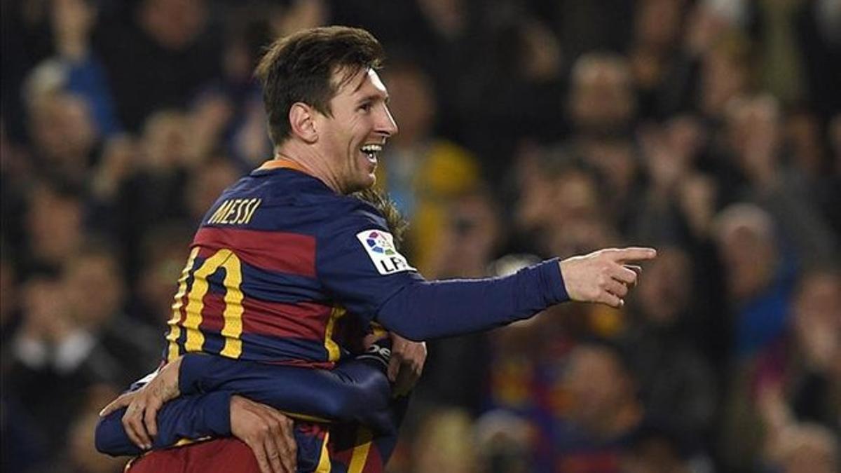 Messi celebra una de sus goles al Valencia