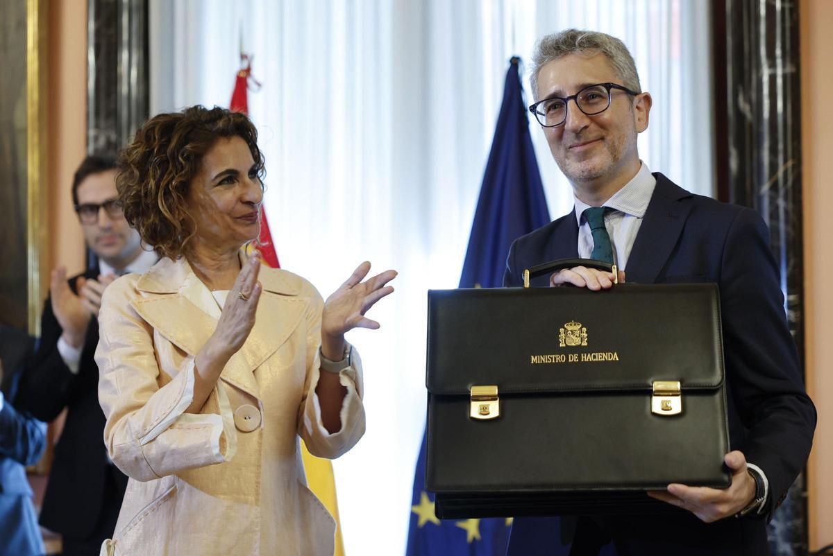 María Jesús Montero y Arcadi España.