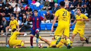 Lance del partido entre el juvenil A del Barça y el EF Gavà