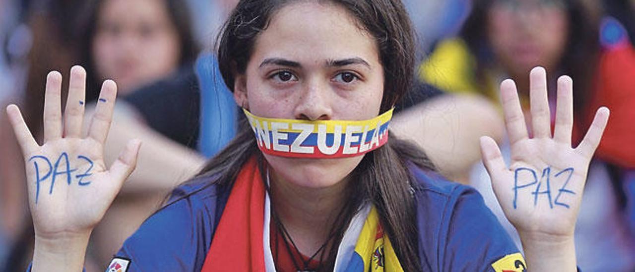 Imagen de una de las manifestaciones celebradas en Venezuela por su crisis política.