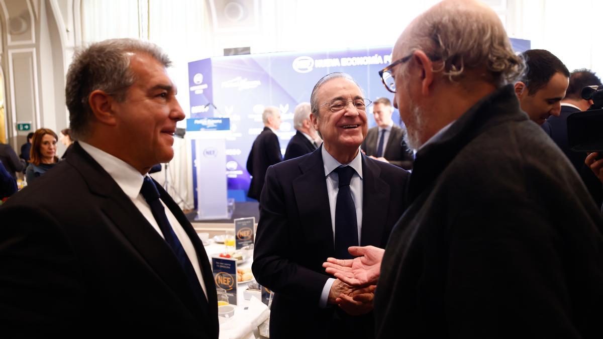 Florentino Perez y Joan Laporta junto a Jaume Roures.