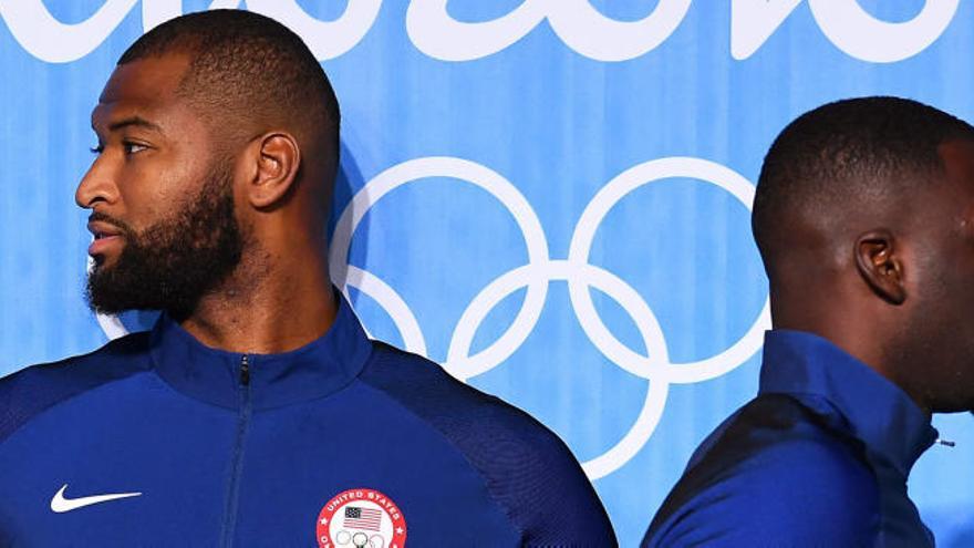 DeMarcus Cousins, junto a Draymond Green.