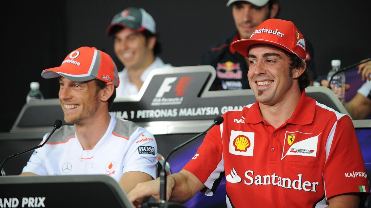 Jenson Button y Fernando Alonso en una imagen de archivo