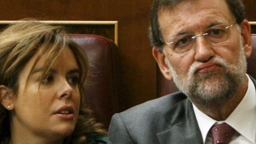 Soraya Sáenz de Santamaría y Mariano Rajoy.