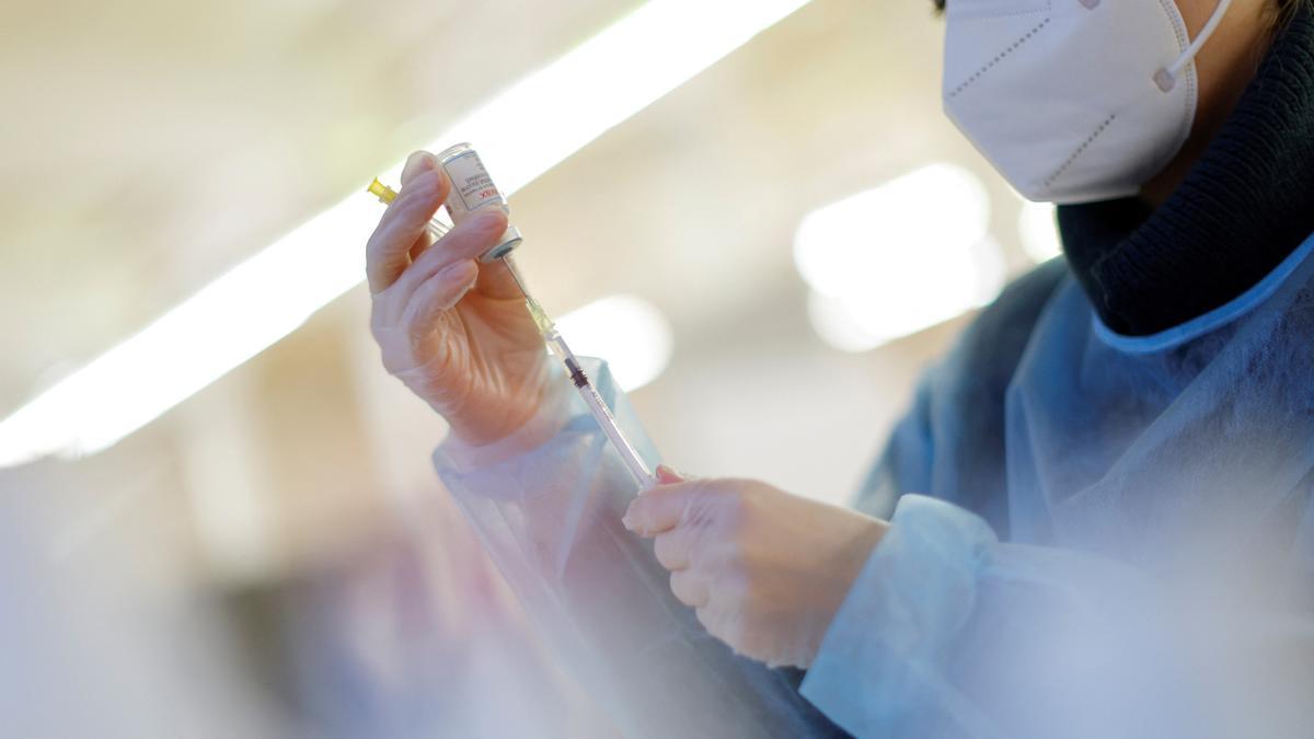 FILE PHOTO: COVID-19 vaccination continues on the first day of 2022, in Berlin