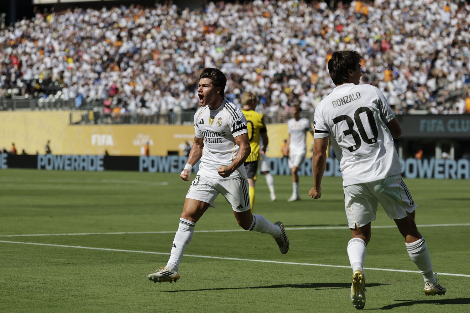 Real Madrid's Fran Garcia celebrates after scoring his side's second goal against Borussia Dortmund during the Club World Cup quarterfinal soccer match between Real Madrid and Borussia Dortmund in East Rutherford, N.J., Saturday, July 5, 2025. (AP Photo/Adam Hunger)