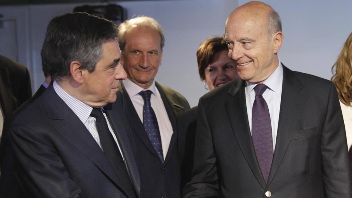 François Fillon y Alain Juppé, juntos en París.