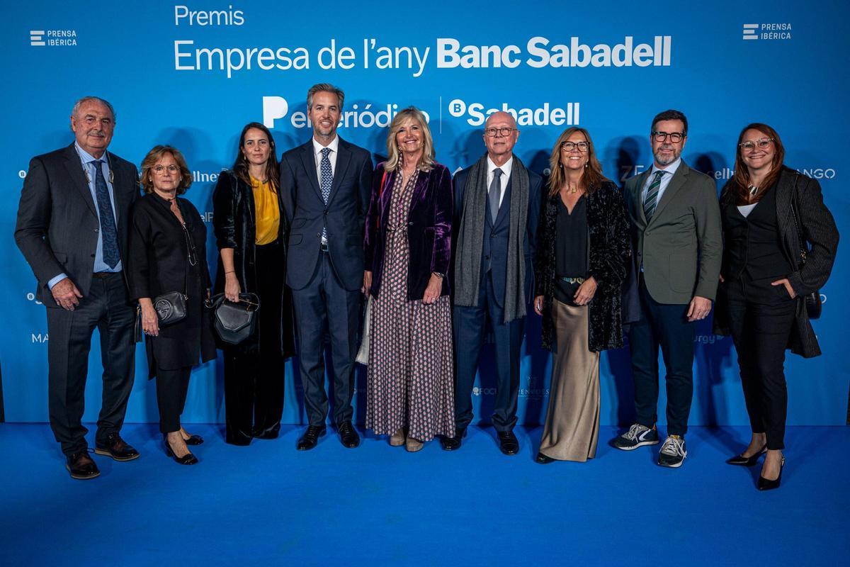 Distintos cargos de la empresa Moventia junto a sus familiares. De izquierda a derecha, Juan Giménez, María José Díaz, Cristina Roure, Miquel Martí Pierre, Ana Pierre Prats, Miquel Martí Escursell, (presidente de Moventia), Sílvia Martí, Santi Colomer Martí y Sandra Llunell