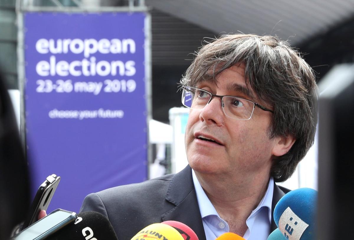 Former Catalan President Carles Puigdemont talks to the media during European Parliament Elections, outside EU Parliament, in Brussels, Belgium May 26, 2019.  REUTERS/Yves Herman