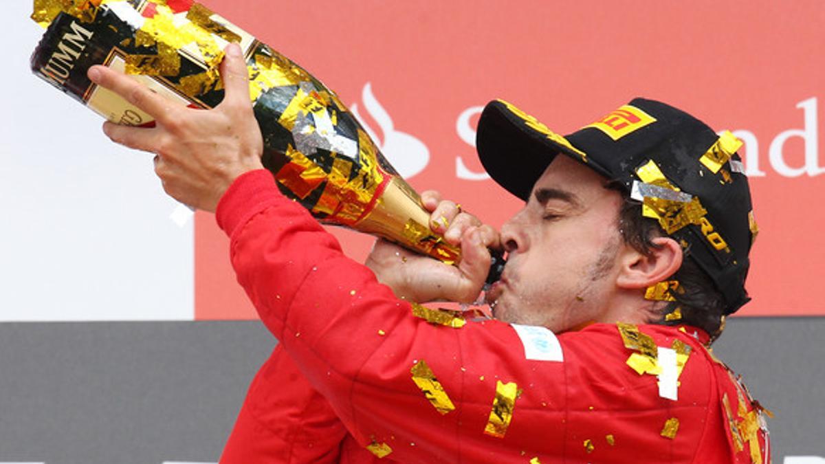 Fernando Alonso celebra su victoria en el Gran Premio de Alemania de F-1, este domingo.