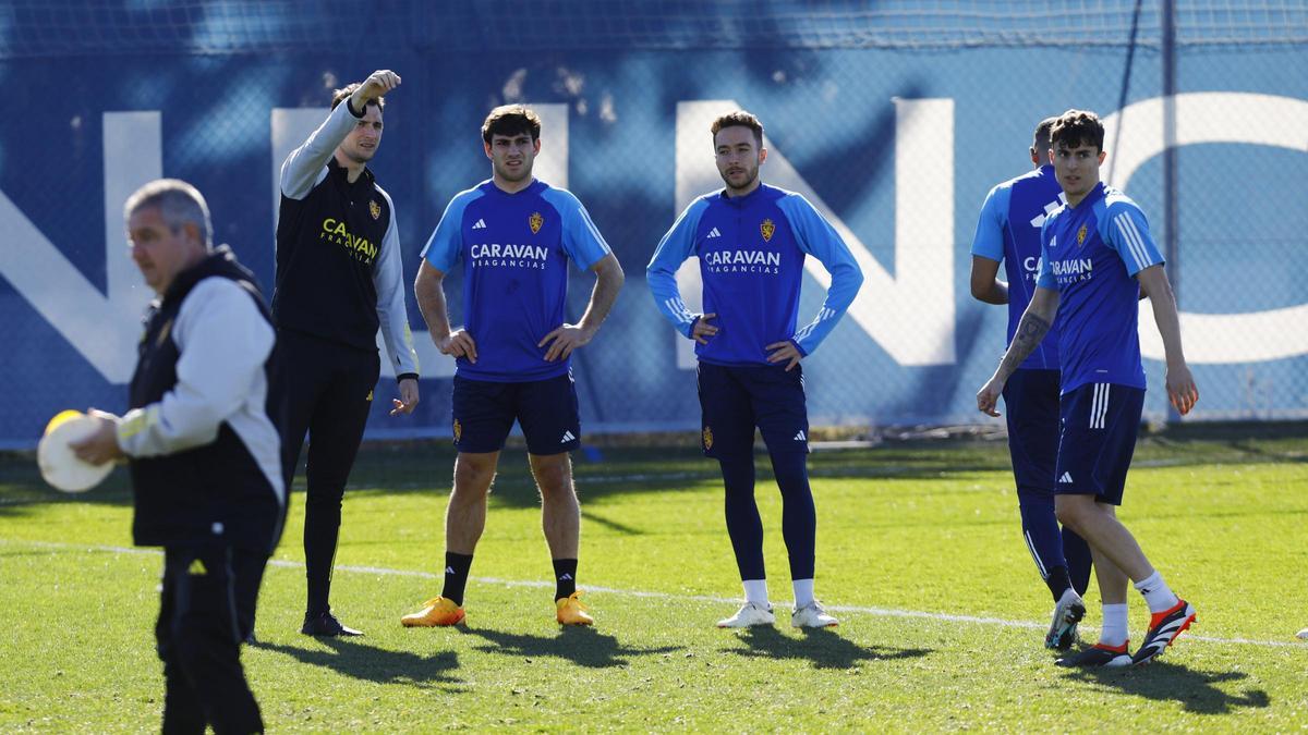 Azón, Marc Aguado y Francés, durante un entrenamiento.