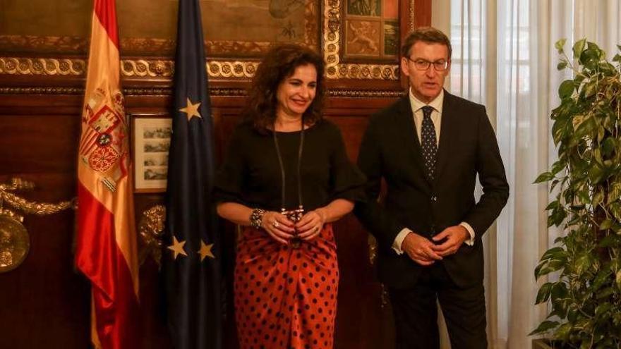 María Jesús Montero y Núñez Feijóo, en la reunión que mantuvieron en agosto.