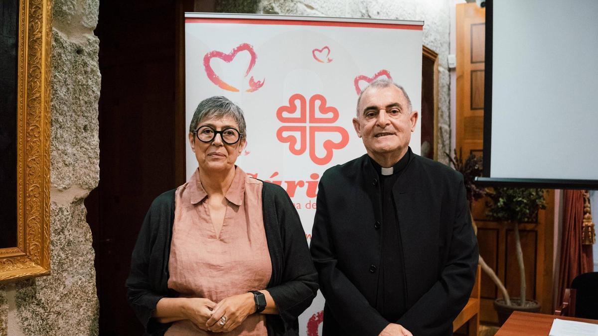 María Tabarés y José Ángel Feijóo Mirón durante la presentación del balance de Cáritas de 2025