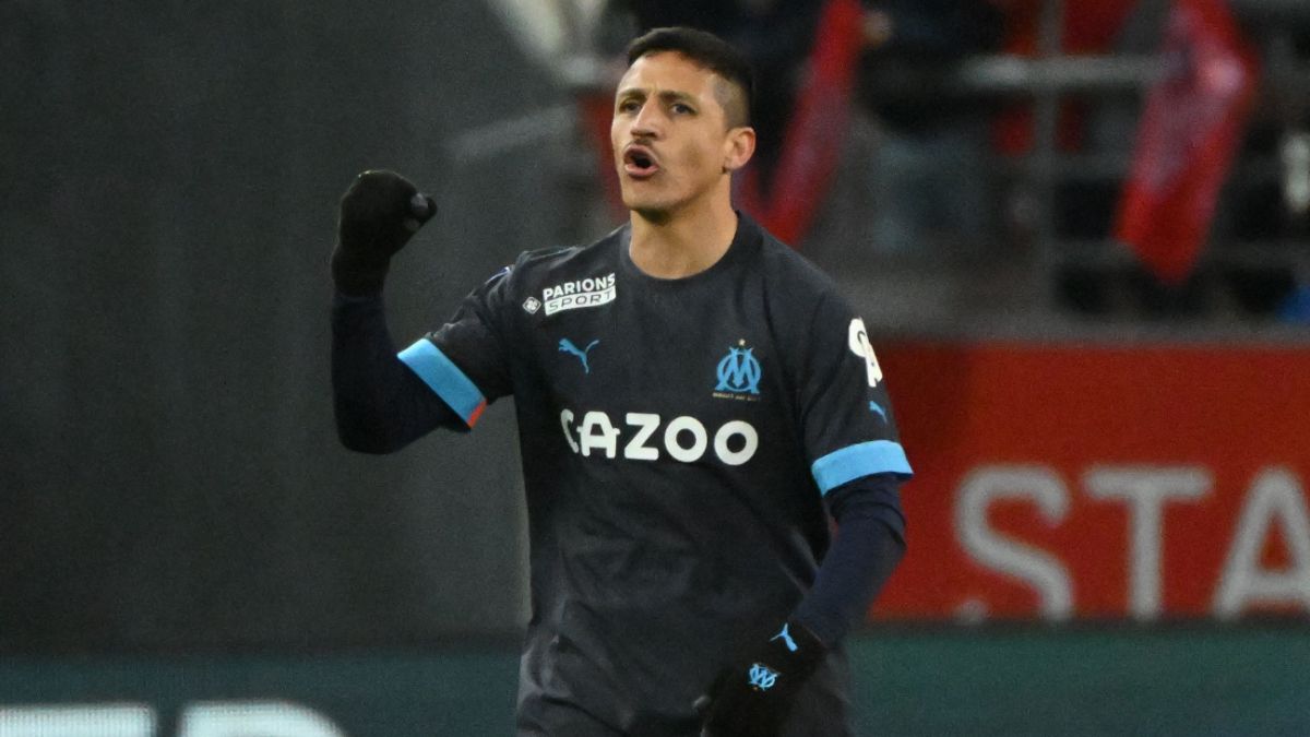 Alexis Sánchez celebrando su doblete ante el Reims