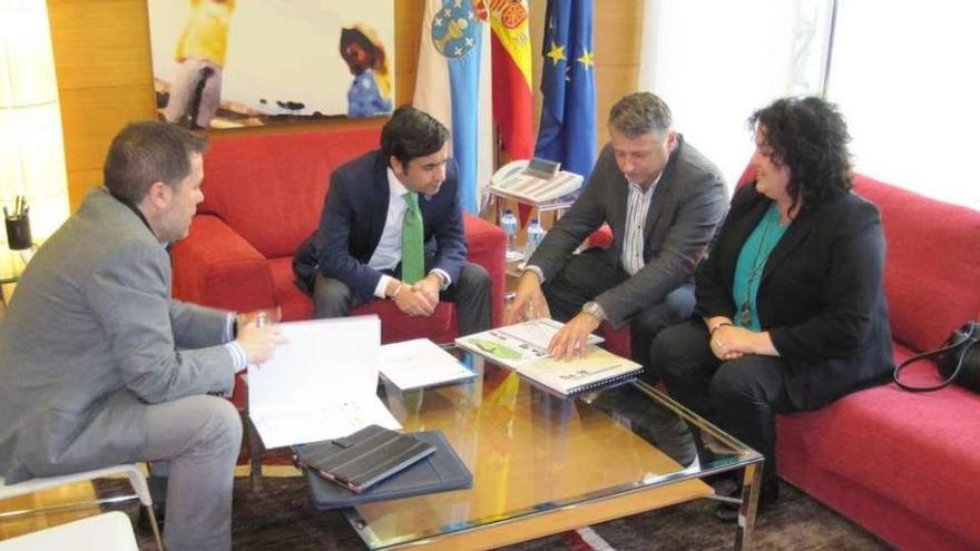 Rodríguez, Rey, Cuiña y Peón, ayer, durante su reunión en Santiago.