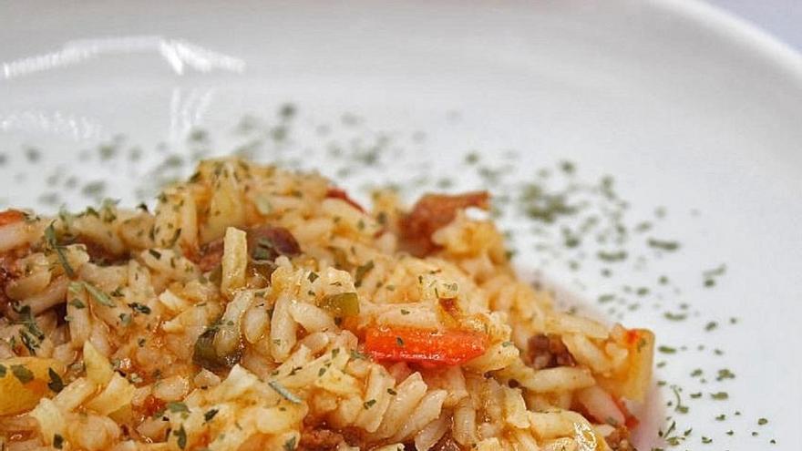 Arroz con pota y un toque especial de cilantro