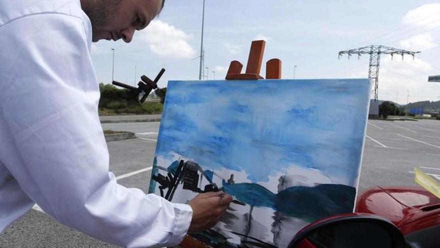 Uno de los participantes pinta un paisaje corverano.