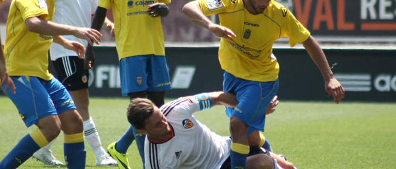 Diferentes momento del partido de cuartos de final de la Copa del Rey disputado en Valencia.