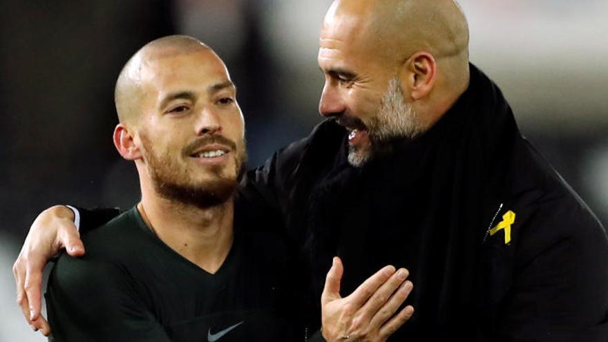 David Silva y Pep Guardiola.