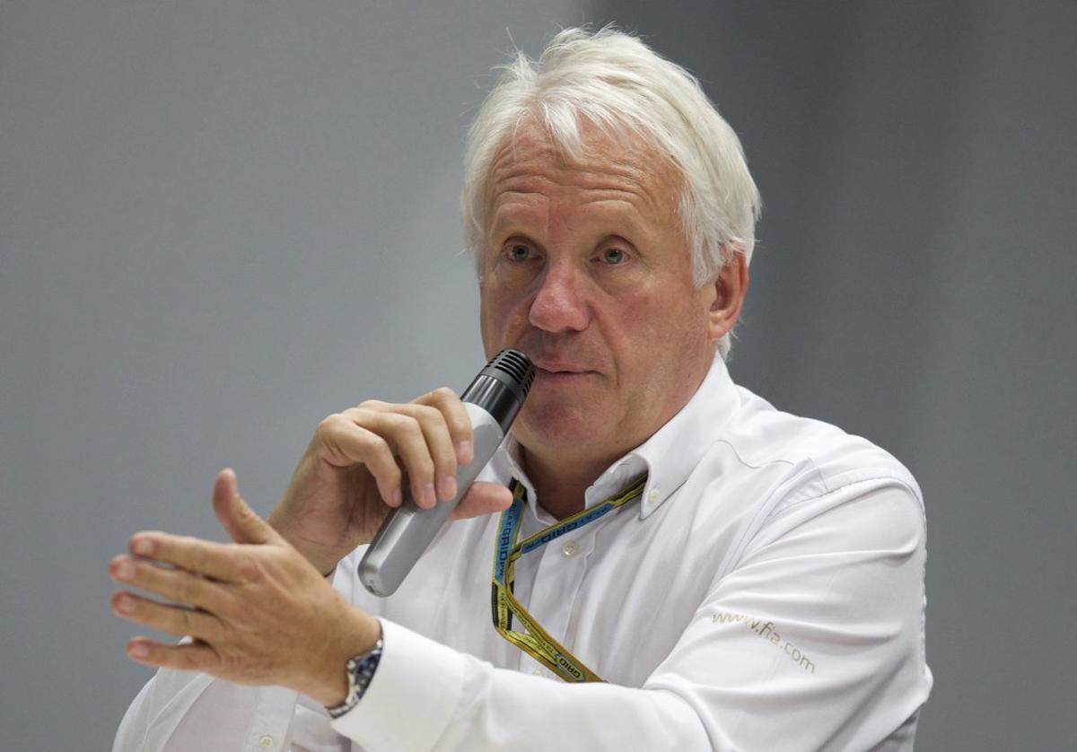 FILE - In this Oct. 10, 2014, file photo, Charlie Whiting, International Automobile Federation, or FIA, Race Director, gestures answering a question during a news conference at the ’Sochi Autodrom’ Formula One circuit , in Sochi, Russia. The governing body for international auto racing says its Formula One director Whiting has died from a pulmonary embolism. He was 66. The FIA issued a statement Thursday, March 14, saying Whiting died in Melbourne, where the season-opening Australian Grand Prix will be raced on Sunday.  (AP Photo/Pavel Golovkin, File)