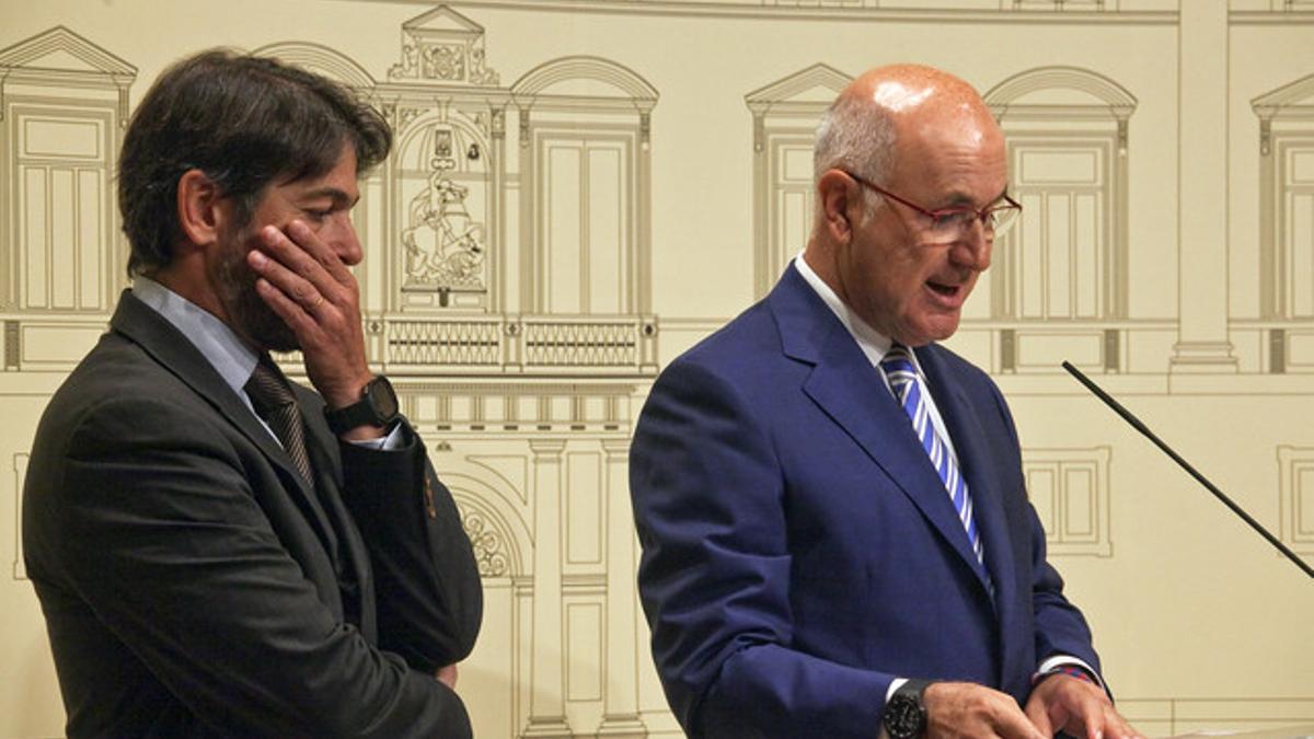 Oriol Pujol y Duran Lleida, durante una rueda de prensa posterior a la cumbre fiscal, el pasado julio.