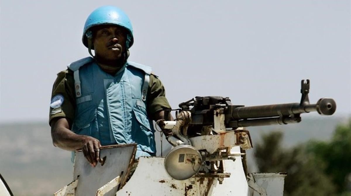 bgonzalez5008362 a un peacekeeper from ghana sits atop an armoured 160304100616