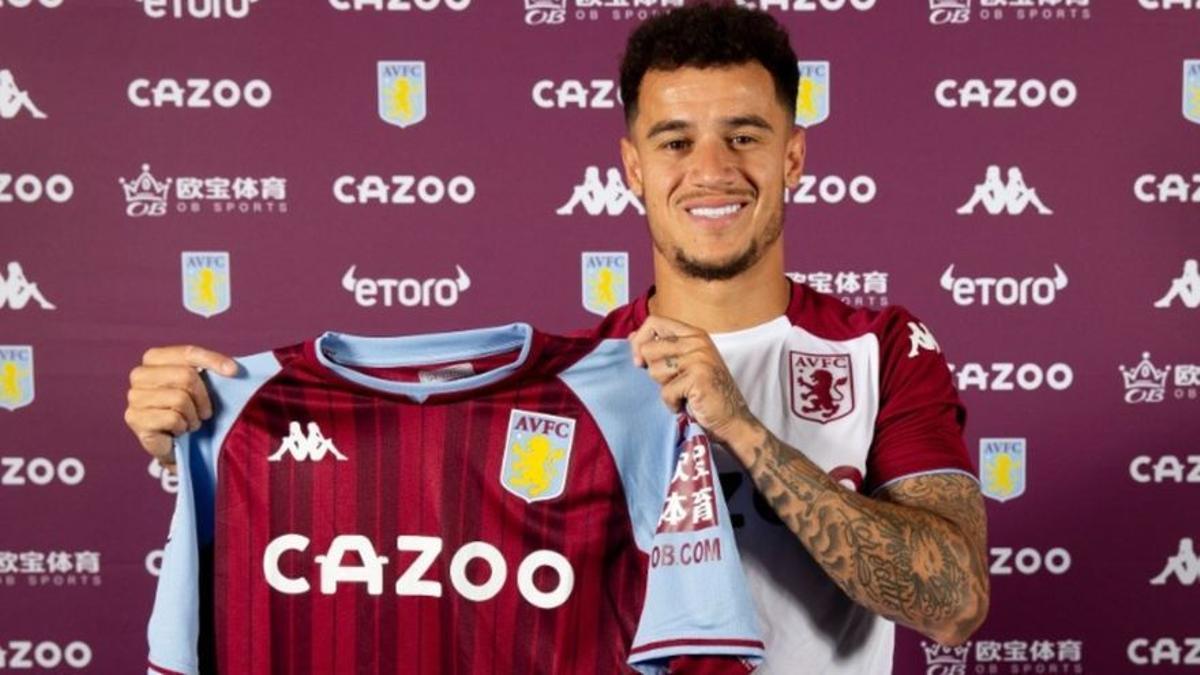 Coutinho posa con la camiseta del Aston Villa tras anunciarse que el Barça lo ha vendido.