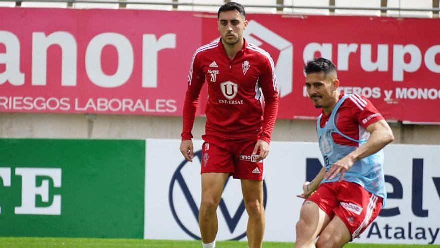 Armando y Aguza en el entrenamiento de ayer en Nueva Condomina. | PRENSA REAL MURCIA