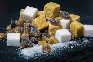 ¿Pot convertir-se el sucre en el següent problema per al cistell de consum?
