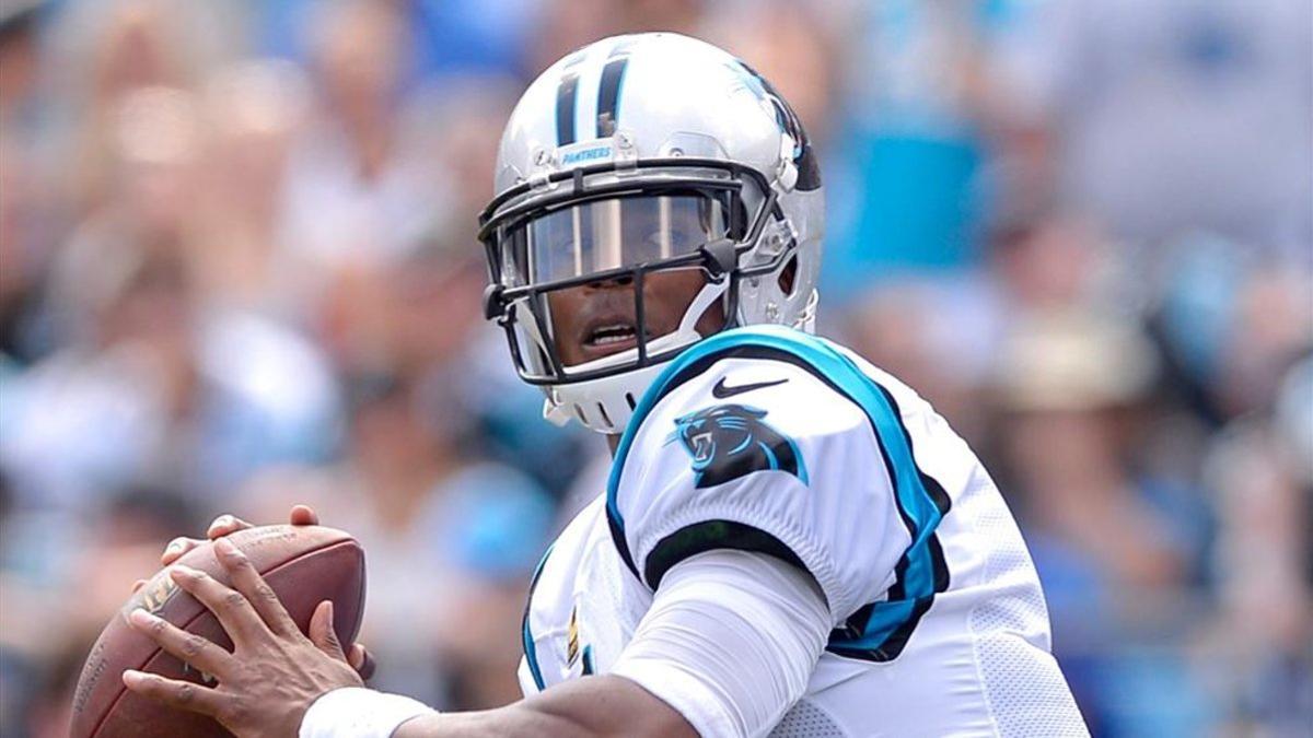 Cam Newton, quarterback de los Carolina Panthers, buscará hacer buenas migas con Holyfield