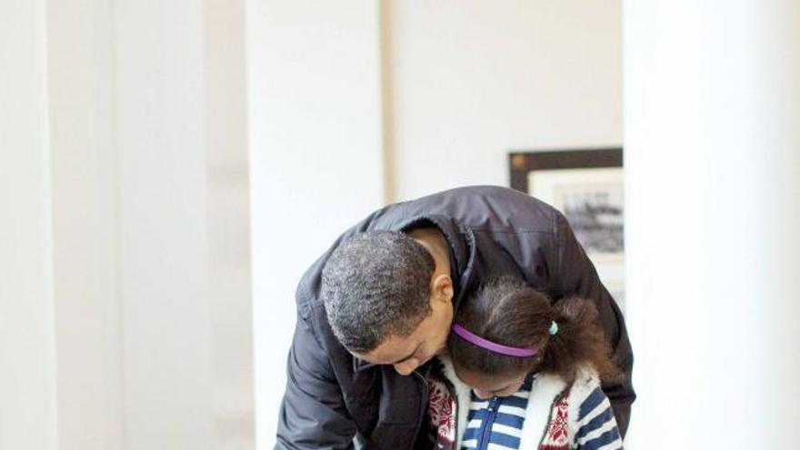 La familia Obama con Bo