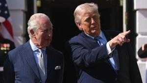US President Donald Trump (R) talks with Britains King Charles III upon his arrival at the South Portico of the White House in Washington, DC, on April 27, 2026. (Photo by SAUL LOEB / AFP)