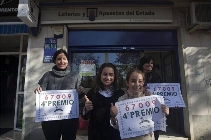 Fotogalería: Los premios de la lotería se dejan caer por la provincia