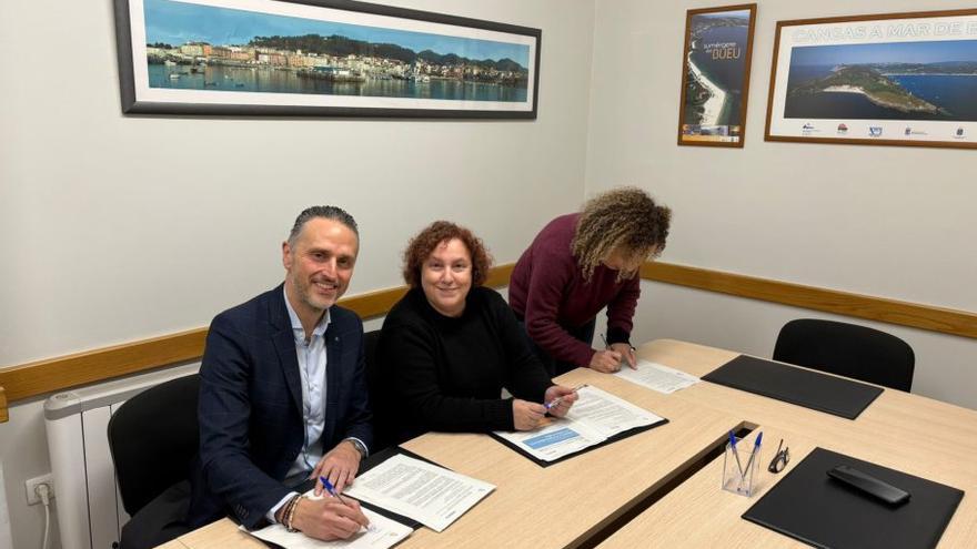 El responsable de Abanca y la presidenta de Fecimo. |  FdV