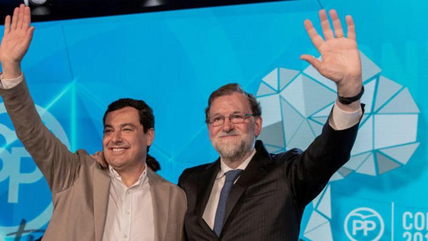 Juanma Moreno, con Mariano Rajoy.